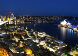 Sydney Cove at Night between the Harbour Bridge and Opera House